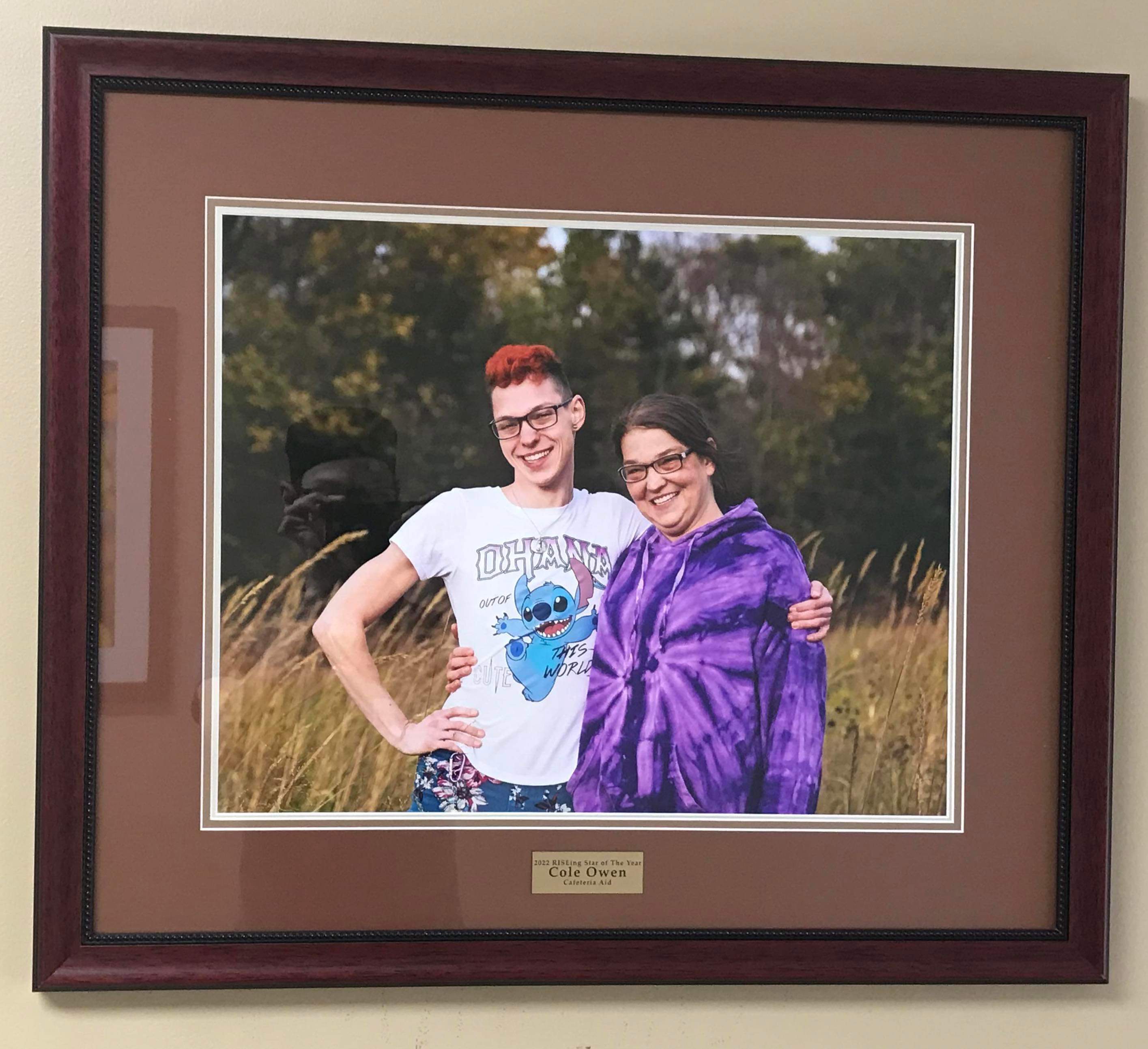 Cole and his mom on the day he was acknowledged by the hospital with the Rising Star award.